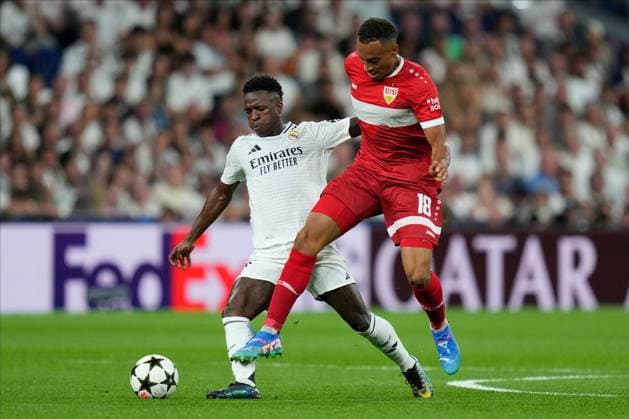 Vinicius Junior of Real Madrid CF and Jamie Leweling of Atletico de Madrid Real Madrid v VFB Stuttgart, UEFA Champios League match, date 1. Football, Santiago Bernabeu Stadium, Madrid, Spain - 17 Sep 2024 Editorial use only  Copyright: xPressinphoto Shutterstockx 14725330f