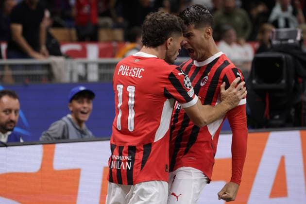 Milan, Italy, 17th September 2024. Christian Pulisic of AC Milan celebrates with team mate Alvaro Morata after scoring to give the side a 1-0 lead during the UEFA Champions League match at Giuseppe Meazza, Milan. Picture credit should read: Jonathan Moscrop Sportimage EDITORIAL USE ONLY. No use with unauthorised audio, video, data, fixture lists, club league logos or live services. Online in-match use limited to 120 images, no video emulation. No use in betting, games or single club league player publications. SPI-3297-0018