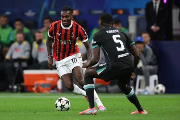 Milan, Italy, 17th September 2024.Rafael Leao of AC Milan takes on Ibrahima Konate of Liverpool FC during the UEFA Champions League match at Giuseppe Meazza, Milan. Picture credit should read: Jonathan Moscrop Sportimage EDITORIAL USE ONLY. No use with unauthorised audio, video, data, fixture lists, club league logos or live services. Online in-match use limited to 120 images, no video emulation. No use in betting, games or single club league player publications. SPI-3297-0020