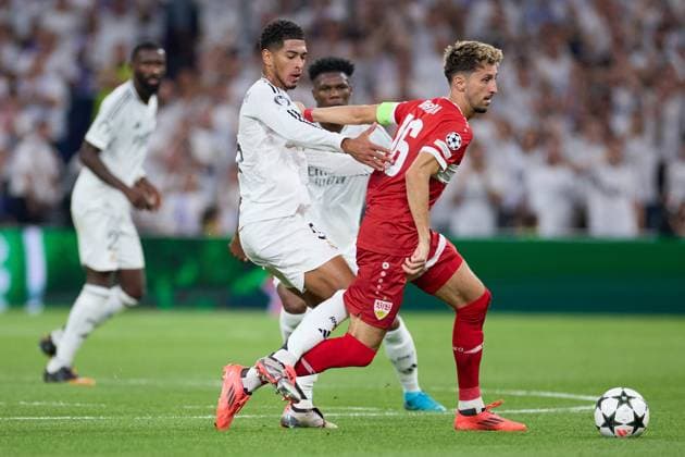Jude Bellingham of Real Madrid CF battles for the ball with Atakan Karazor of Stuttgart during the UEFA Champions League match between Real Madrid v VFB Stuttgart at Santiago Bernabeu on September 17, 2024 in Madrid (Photo by: LGM) FOOTBALL : Real Madrid vs VFB Stuttgart - UEFA Ligue des Champions - 17 09 2024 LGM Panoramic 