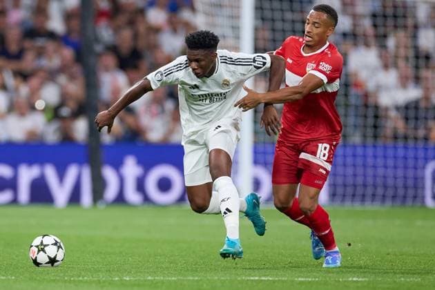 Aurelien Tchouameni of Real Madrid CF battles for the ball with Jamie Leweling of Stuttgart during the UEFA Champions League match between Real Madrid v VFB Stuttgart at Santiago Bernabeu on September 17, 2024 in Madrid (Photo by: LGM) FOOTBALL : Real Madrid vs VFB Stuttgart - UEFA Ligue des Champions - 17 09 2024 LGM Panoramic 