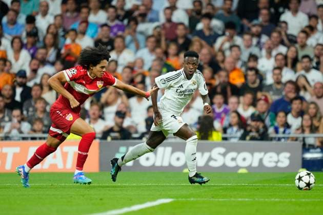 Real Madrid C.F. v VfB Stuttgart - UEFA Champions League 2024 25 League Phase MD1 Vinicius Junior left winger of Real Madrid and Brazil and Anrie Chase centre-back of Stuttgart and Japan compete for the ball during the UEFA Champions League 2024 25 League Phase MD1 match between Real Madrid C.F. and VfB Stuttgart at Estadio Santiago Bernabeu on September 17, 2024 in Madrid, Spain. Madrid Spain  Copyright: xJosexBretonx originalFilename:bretonhernandez-realmadr240917_npkAM.jpg