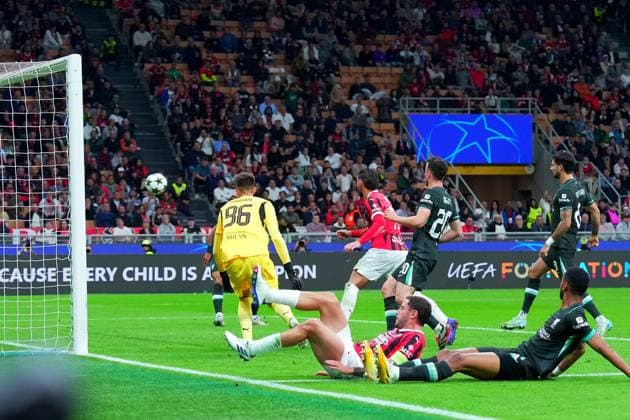 LiverpoolDominik Szobosziai scores the goal 3-1 during the Uefa Champions League soccer match between Milan and Liverpool at the San Siro Stadium in Milan, north Italy -Tuesday , September 17 2024. - Soccer .  Copyright: xSpada LaPressex