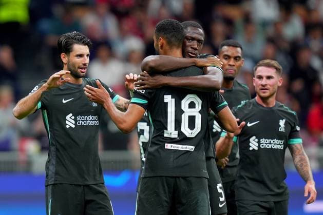 Liverpool Dominik Szobosziai celebrates after scoring 3-1 during the Uefa Champions League soccer match between Milan and Liverpool at the San Siro Stadium in Milan, north Italy -Tuesday , September 17 2024. - Soccer .  Copyright: xSpada LaPressex