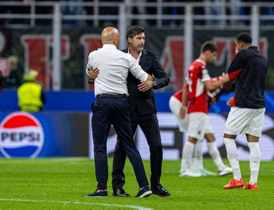 Football - UEFA Champions League - League Phase - AC Milan v Liverpool FC MILAN, ITALY - Tuesday, September 17, 2024: Liverpool s head coach Arne Slot (L) and AC Milan s head coach Paulo Fonseca after the UEFA Champions League game between AC Milan and Liverpool FC at the Stadio San Siro. ITALY Stadio San Siro LOMBARDY ITALY  Copyright: xDavidxRawcliffex P2024-09-17-AC_Milan_Liverpool-77