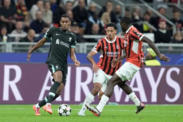 Cody Gakpo (Liverpool FC) and Tijjani Reijnders (AC Milan) battle for the ball, UEFA Champions League 2024 25 League Phase MD1, AC Milan v Liverpool FC, Stadio Giuseppe Meazza (San Siro), September 17, 2024, Milan, Italy.