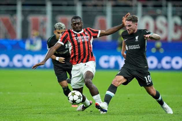 Youssouf Fofana (AC Milan) and Alexis Mac Allister (Liverpool FC) battle for the ball, UEFA Champions League 2024 25 League Phase MD1, AC Milan v Liverpool FC, Stadio Giuseppe Meazza (San Siro), September 17, 2024, Milan, Italy.