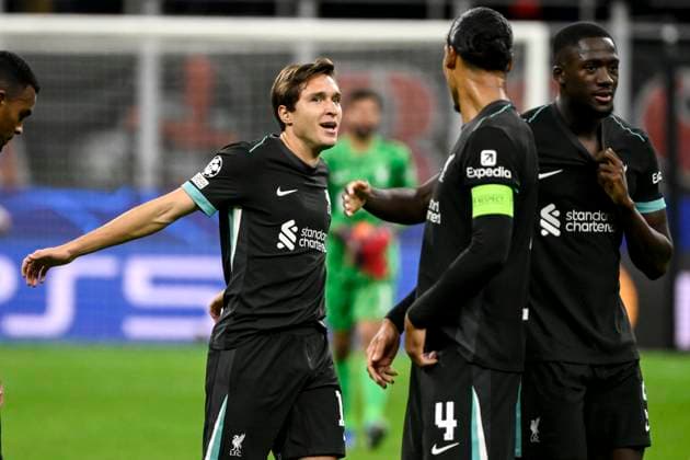 Federico Chiesa of Liverpool FC celebrates with team mates at the end of the UEFA Champions League 2024 205 football match between AC Milan and Liverpool FC at San Siro stadium in Milano (Italy), September 17, 2024. AndreaxStaccioli