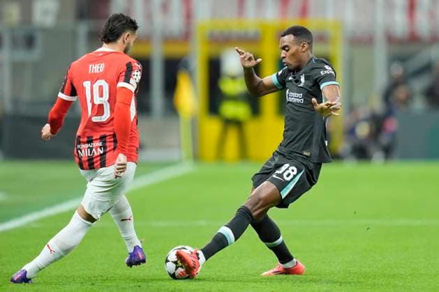 Ryan Gravenberch of Liverpool FC competes for the ball with Theo Hernandez of AC Milan during the Uefa Champions League match between AC Milan and Liverpool at Stadio San Siro Milan Italy on 17 September 2024. Milan Stadio San Siro Milan Italy Copyright: xPhotoxGoalxPixx SP24-989-014