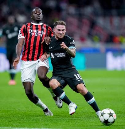 AC Milan v Liverpool FC - UEFA Champions League 2024 25 Alexis Mac Allister of Liverpool FC and Youssouf Fofana of AC Milan compete for the ball during the UEFA Champions League 2024 25 League Phase MD1 match between AC Milan and Liverpool FC at Stadio San Siro on September 17, 2024 in Milan, Italy. Milan Stadio Giuseppe Meazza Florence Italy Copyright: xGiuseppexMaffiax UCL_Milan-Liverpool_170924_BRU2336