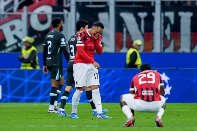 AC Milan v Liverpool FC - UEFA Champions League 2024 25 Noah Okafor of AC Milan and Youssouf Fofana of AC Milan look dejected at the end of the UEFA Champions League 2024 25 League Phase MD1 match between AC Milan and Liverpool FC at Stadio San Siro on September 17, 2024 in Milan, Italy. Milan Stadio Giuseppe Meazza Florence Italy Copyright: xGiuseppexMaffiax UCL_Milan-Liverpool_170924_BRU4726