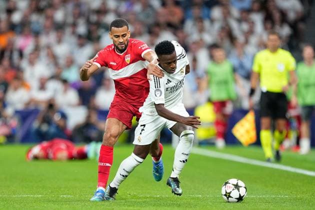 September 17, 2024, Madrid, Madrid, SPAIN: Vinicius Junior of Real Madrid and Josha Vagnoman of Stuttgart in action during the UEFA Champions League 2024 25 League Phase MD1 match between Real Madrid CF and VfB Stuttgart at Estadio Santiago Bernabeu on September 17, 2024 in Madrid, Spain. Madrid SPAIN - ZUMAa181 20240917_zaa_a181_092 Copyright: xOscarxJ.xBarrosox