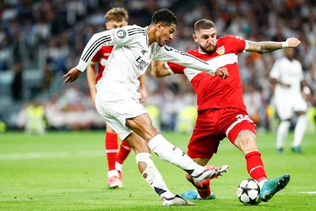 September 17, 2024, Madrid, Madrid, SPAIN: Jude Bellingham of Real Madrid and Jeff Chabot of Stuttgart in action during the UEFA Champions League 2024 25 League Phase MD1 match between Real Madrid CF and VfB Stuttgart at Estadio Santiago Bernabeu on September 17, 2024 in Madrid, Spain. Madrid SPAIN - ZUMAa181 20240917_zaa_a181_192 Copyright: xIrinaxR.xHipolitox