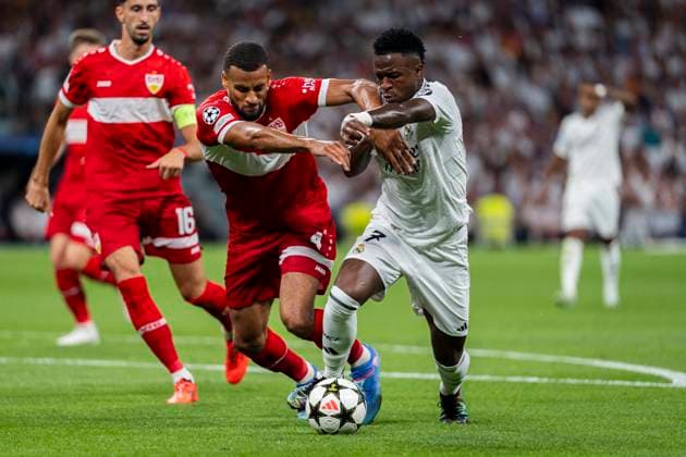Real Madrid CF v VfB Stuttgart - UEFA Champions League 2024 25 League Phase MD1 Vinicius Junior of Real Madrid CF (R) in action with the ball against Josha Vagnoman of VfB Stuttgart (L) during the UEFA Champions League 2024 25 League Phase MD1 match between Real Madrid C.F. and VfB Stuttgart at Estadio Santiago Bernabeu on September 17, 2024 in Madrid, Spain. Madrid Estadio Santiago Bernabeu Madrid Spain Copyright: xAlbertoxGardinx AGardin_20240917_Football_Champions_Real_Madrid_vs_Stuttgart_196