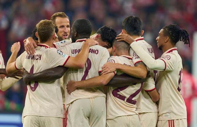 Raphael Guerreiro, FCB 22 celebrates his goal, happy, laugh, celebration, 2-0 with Harry Kane, FCB 9 Michael Olise (FCB 17) in the group league match FC BAYERN MUENCHEN - DINAMO ZAGREB 9-2 of football UEFA Champions League in season 2024 2025 in Munich, Sep 17, 2024 , FCB, 1. Spieltag, München
