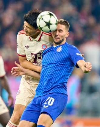 MinJae Kim, Min-Jae Kim , FCB 3 compete for the ball, tackling, duel, header, zweikampf, action, fight against Marko Pjaca, Zagreb 20 in the group league match FC BAYERN MUENCHEN - DINAMO ZAGREB 9-2 of football UEFA Champions League in season 2024 2025 in Munich, Sep 17, 2024 , FCB, 1. Spieltag, München
