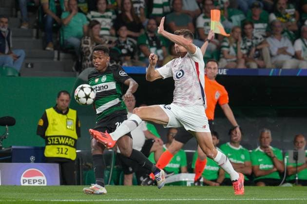 Sporting CP Vs Lille OSC in Lisbon, Portugal - 17 Sept 2024 Geny Catamo of Sporting CP (L) and Thomas Meunier of Lille OSC (R) in action during the UEFA Champions League phase first match between Sporting CP and Lillie OSC at Estadio Jose Alvalade. Final score: Sporting CP 2:0 Lille OSC Lisbon Portugal Copyright: xBrunoxdexCarvalhox xSOPAxImagesx brunodecarvalho_sportinglille-551