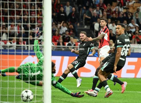 (240918) -- MILAN, Sept. 18, 2024 -- AC Milan s Christian Pulisic (3rd L) scores his goal during the first round match of UEFA Champions League between AC Milan and Liverpool in Milan, Italy, Sept.17, 2024. (Photo by Xinhua) (SP)ITALY-MILAN-FOOTBALL-UEFA CHAMPIONS LEAGUE-AC MILAN VS LIVERPOOL AlbertoxLingria 