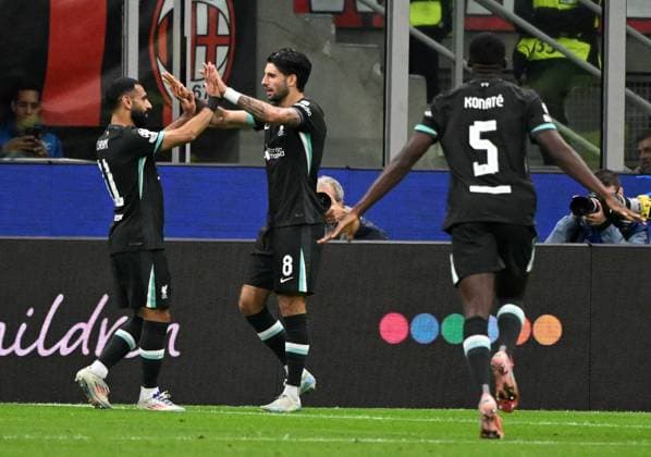 (240918) -- MILAN, Sept. 18, 2024 -- Liverpool s Dominik Szoboszlai (C) celebrates his goal with teammates during the first round match of UEFA Champions League between AC Milan and Liverpool in Milan, Italy, Sept.17, 2024. (Photo by Xinhua) (SP)ITALY-MILAN-FOOTBALL-UEFA CHAMPIONS LEAGUE-AC MILAN VS LIVERPOOL AlbertoxLingria 