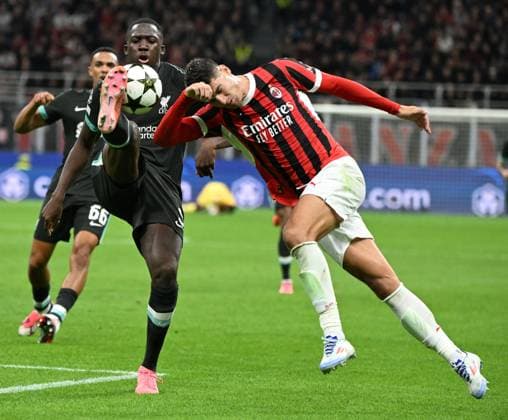 (240918) -- MILAN, Sept. 18, 2024 -- AC Milan s Alvaro Morata (R) vies with Liverpool s Ibrahima Konate during the first round match of UEFA Champions League between AC Milan and Liverpool in Milan, Italy, Sept.17, 2024. (Photo by Xinhua) (SP)ITALY-MILAN-FOOTBALL-UEFA CHAMPIONS LEAGUE-AC MILAN VS LIVERPOOL AlbertoxLingria 