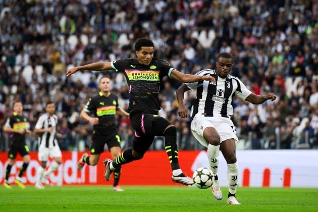 Juventus FC v PSV Eindhoven - UEFA Champions League Malik Tillman of PSV Eindhoven competes for the ball with Pierre Kalulu of Juventus FC during the UEFA Champions League football match between Juventus FC and PSV Eindhoven. Turin Italy Copyright: xNicolòxCampox