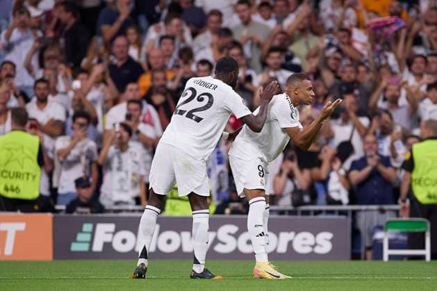 Real Madrid CF Vs VfB Stuttgart in Madrid, Spain - 17 Sept 2024 Antonio Rudiger (L) of Real Madrid CF and Kylian Mbappe (R) of Real Madrid CF celebrate a goal during the 2024 2025 UEFA Champions League week 1 football match between Real Madrid CF and VfB Stuttgart at Santiago Bernabeu stadium. Final score: Real Madrid CF 3 : 1 VfB Stuttgart Madrid Spain Copyright: xFedericoxTitonex xSOPAxImagesx FTITONE_0035