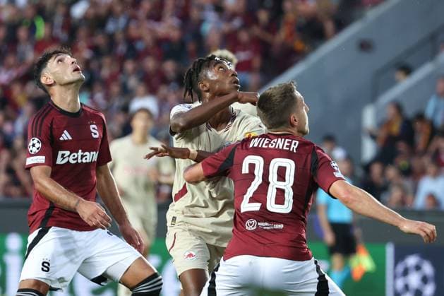 SOCCER - UEFA CL, Prag vs RBS PRAGUE,CZECH REPUBLIC,18.SEP.24 - SOCCER - UEFA Champions League, AC Sparta Prag vs Red Bull Salzburg. Image shows Qazim Laci (Sparta), Dorgeles Nene (RBS) and Tomas Wiesner (Sparta).  GEPAxpictures xDavidxGeieregger