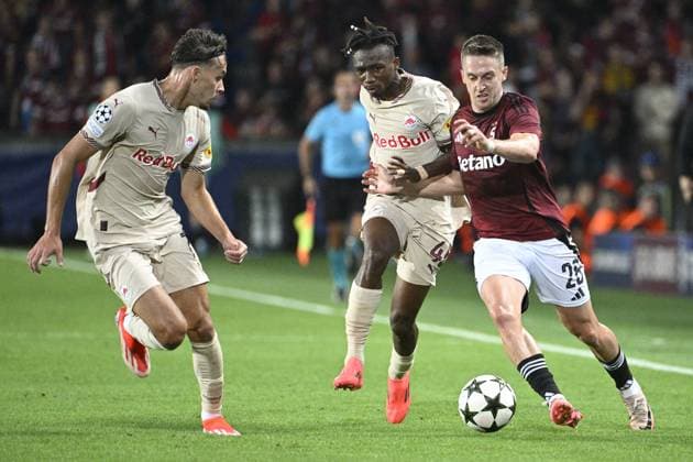 From right Tomas Wiesner of Sparta and Dorgeles Nene of Salcburg in action during the Football Champions League 1st round match: Sparta Prague vs Red Bull Salzburg in Prague, Czech Republic, September 18, 2024. (CTKxPhoto MichalxKamaryt) CTKPhotoP2024091808112  CTKPhotoP2024091808112