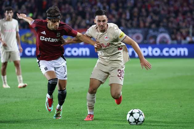 SOCCER - UEFA CL, Prag vs RBS PRAGUE,CZECH REPUBLIC,18.SEP.24 - SOCCER - UEFA Champions League, AC Sparta Prag vs Red Bull Salzburg. Image shows Veljko Birmancevic (Sparta) and Oscar Gloukh (RBS).  GEPAxpictures xDavidxGeieregger