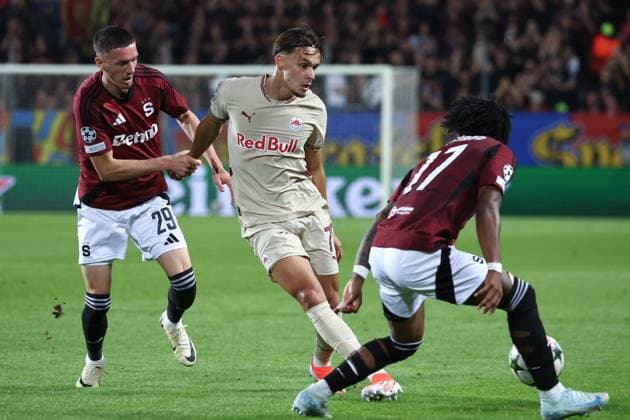 SOCCER - UEFA CL, Prag vs RBS PRAGUE,CZECH REPUBLIC,18.SEP.24 - SOCCER - UEFA Champions League, AC Sparta Prag vs Red Bull Salzburg. Image shows Ermal Krasniqi (Sparta) and Amar Dedic (RBS).  GEPAxpictures xDavidxGeieregger