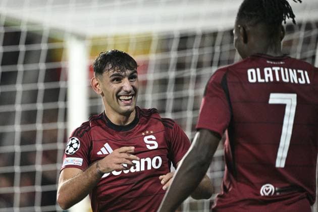 From left Qazim Laci of Sparta celebrates goal, Victor Olatunji in action during the Football Champions League 1st round match: Sparta Prague vs Red Bull Salzburg in Prague, Czech Republic, September 18, 2024. (CTKxPhoto MichalxKamaryt) CTKPhotoP2024091808579  CTKPhotoP2024091808579