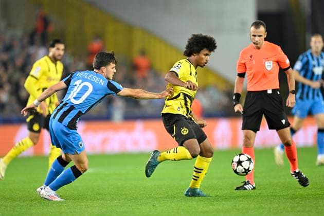 Club Brugge v Borussia Dortmund - UEFA Champions League BRUGGE, BELGIUM - SEPTEMBER 18 : Vetlesen Hugo midfielder of Club Brugge and Adeyemi Karim forward of Borussia Dortmund during the UEFA Champions League - League phase matchday 1 match between Club Brugge and Borussia Dortmund at the Jan Breydel stadium on September 18, 2024 in Bruges , Belgium , 18 09 2024 Brugge Belgium  Copyright: xNicoxVereeckenx