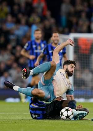 Manchester, England, 18th September 2024. JoÅ¡ko Gvardiol of Manchester City tussles with Marcus Thuram of Inter Milan during the UEFA Champions League match at the Etihad Stadium, Manchester. Picture credit should read: Andrew Yates Sportimage EDITORIAL USE ONLY. No use with unauthorised audio, video, data, fixture lists, club league logos or live services. Online in-match use limited to 120 images, no video emulation. No use in betting, games or single club league player publications. SPI-3321-0030