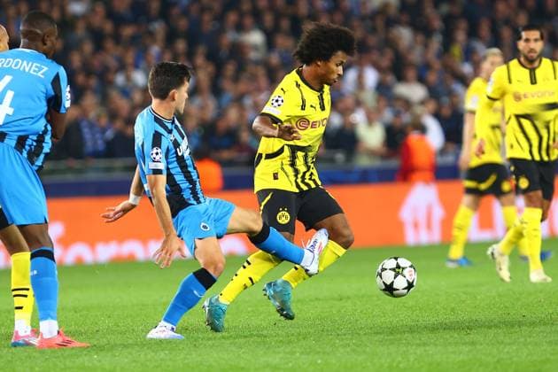 in duel, action, with Hugo Vetlesen 10 Club Brugge Donyell Malen 21 Borussia Dortmund Club Brugge vs Borussia Dortmund, UEFA Champions League, Football, Matchday 1, Season 2024 2025, 18 09 2024 PHOTO kolbert press Ant Palmer Jan Breydel Stadion Belgium Copyright: xkolbert-press AntxPalmerx