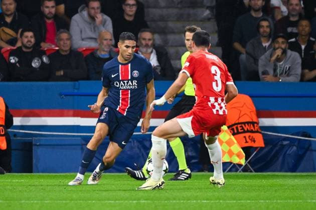Achraf Hakimi ( 2 - PSG ) and Miguel Gutierrez ( 3 - Girona ) during the UEFA Champions League match between Paris Saint Germain and Girona FC at Parc Des Princes on September 18, 2024 in Paris, France. ( Photo by federico pestellini panoramic ) - FOOTBALL : PSG vs Girona - Ligue des Champions - 18 09 2024 FedericoPestellini Panoramic 