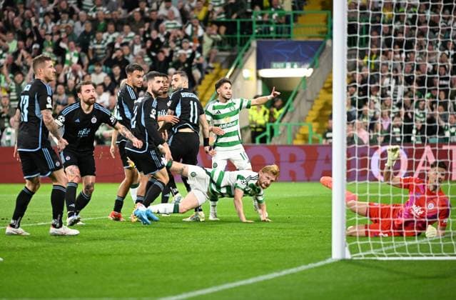 Glasgow, Scotland, 18th September 2024. Liam Scales of Celtic scores the first goal during the UEFA Champions League match at Celtic Park, Glasgow. Picture credit should read: Neil Hanna Sportimage EDITORIAL USE ONLY. No use with unauthorised audio, video, data, fixture lists, club league logos or live services. Online in-match use limited to 120 images, no video emulation. No use in betting, games or single club league player publications. SPI-3322-0008