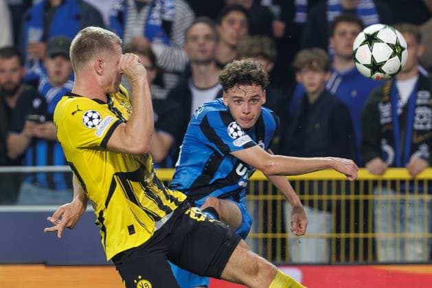Borussia s Julian Ryerson and Club s Maxim De Cuyper fight for the ball during a soccer game between Belgian Club Brugge KV and German Borussia Dortmund, Wednesday 18 September 2024 in Brugge, on the day one of the UEFA Champions League league phase. KURTxDESPLENTER  x100917142x