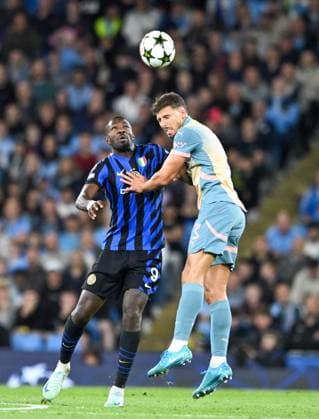 Manchester City v Inter Milan UEFA Champions League Ruben Dias of Manchester City battles for the header with Marcus Thuram of Inter Milan during the UEFA Champions League match at the Etihad Stadium, Manchester UK Newspapers OUT Copyright: xKarlxVallantinex FIL-20645-0019