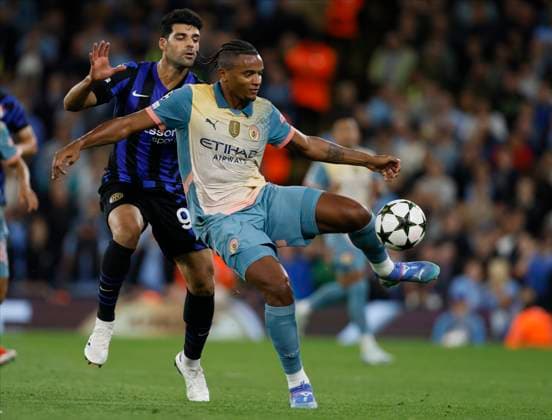 Manchester City v FC Internazionale Milano - UEFA Champions League 2024 25 League Phase MD1 Mehdi Taremi of Inter Milan and Manuel Akanji of Manchester City challenge during the UEFA Champions League 2024 25 League Phase MD1 match between Manchester City and FC Internazionale Milano at City of Manchester Stadium on September 18, 2024 in Manchester, United Kingdom. Manchester City of Manchester Stadium England United Kingdom Copyright: xRichardxSellers Sportsphoto APLx 14048169