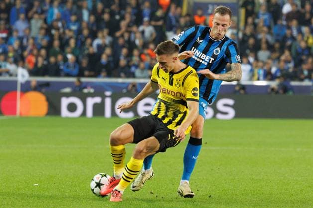 Club s Hugo Siquet and Club s Gustaf Nilsson fight for the ball during a soccer game between Belgian Club Brugge KV and German Borussia Dortmund, Wednesday 18 September 2024 in Brugge, on the day one of the UEFA Champions League league phase. KURTxDESPLENTER  x100917191x