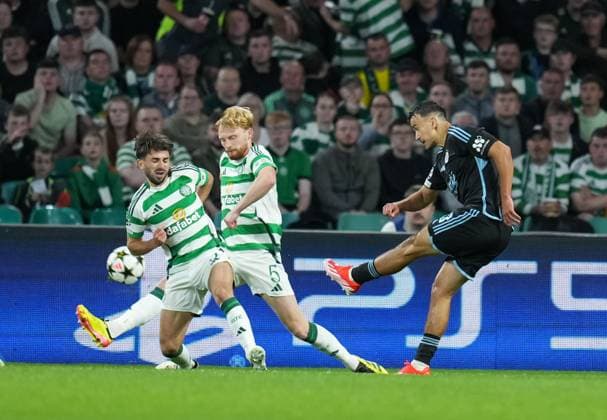 David Strelec of Slovan Bratislava shoots at goal past Greg Taylor & Liam Scales of Celtic. Celtic v Slovan Bratislava, UEFA Champions League, Group Stage, Football, Celtic Park, Glasgow, Scotland, UK, 18 Sep 2024 EDITORIAL USE ONLY No use with unauthorised audio, video, data, fixture lists, club league logos or live services. Online in-match use limited to 120 images, no video emulation. No use in betting, games or single club league player publications.  Copyright: xStuartxWallace Shutterstockx 14722221w