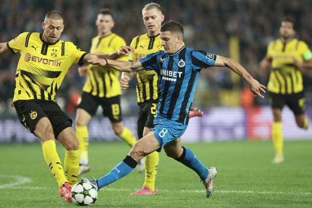 Borussia s Waldemar Anton and Club s Christos Tzolis fight for the ball during a soccer game between Belgian Club Brugge KV and German Borussia Dortmund, Wednesday 18 September 2024 in Brugge, on the day one of the UEFA Champions League league phase. BRUNOxFAHY  x100920573x