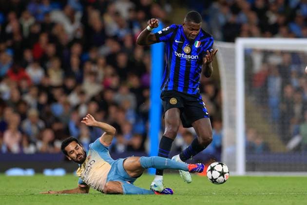 Manchester City v Inter Milan Champions League 18 09 2024. Marcus Thuram (9) of Inter Milan is challenged by Ilkay Gundogan (19) of Manchester City during the Champions League match between Manchester City and Inter Milan at the Etihad Stadium, Manchester, England on 18 September 2024. Manchester Etihad Stadium Manchester England Editorial use only , Copyright: xConorxMolloyx PSI-20434-0045