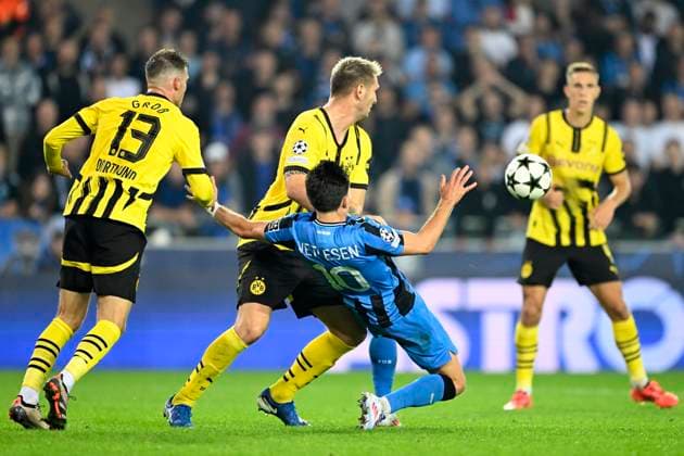 Club Brugge v Borussia Dortmund - UEFA Champions League BRUGGE, BELGIUM - SEPTEMBER 18 : Vetlesen Hugo midfielder of Club Brugge and Sule Niklas defender of Borussia Dortmund during the UEFA Champions League - League phase matchday 1 match between Club Brugge and Borussia Dortmund at the Jan Breydel stadium on September 18, 2024 in Bruges , Belgium , 18 09 2024 Brugge Belgium  Copyright: xNicoxVereeckenx