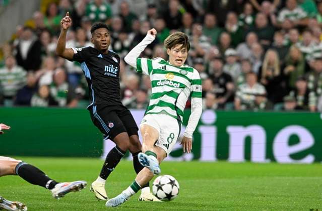 Glasgow, Scotland, 18th September 2024. Kyogo Furuhashi of Celtic and Cesar Blackman of Å K Slovan Bratislava during the UEFA Champions League match at Celtic Park, Glasgow. Picture credit should read: Neil Hanna Sportimage EDITORIAL USE ONLY. No use with unauthorised audio, video, data, fixture lists, club league logos or live services. Online in-match use limited to 120 images, no video emulation. No use in betting, games or single club league player publications. SPI-3322-0010