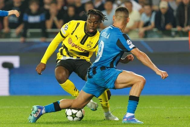 Borussia s Jamie Gittens and Club s Ferran Jutgla fight for the ball during a soccer game between Belgian Club Brugge KV and German Borussia Dortmund, Wednesday 18 September 2024 in Brugge, on the day one of the UEFA Champions League league phase. KURTxDESPLENTER  x100922721x