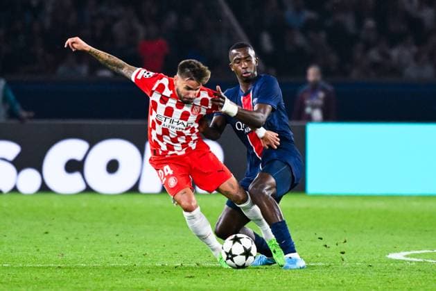 Cristian Portu ( 24 - Girona ) and William Joel Tenorio Pacho ( 51 - PSG ) during the UEFA Champions League match between Paris Saint Germain and Girona FC at Parc Des Princes on September 18, 2024 in Paris, France. ( Photo by federico pestellini panoramic ) - FOOTBALL : PSG vs Girona - Ligue des Champions - 18 09 2024 FedericoPestellini Panoramic 