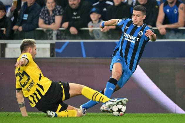 Bruegge, Jan Breydel Stadion, 18 09 24, GER, Men, UEFA Champions League, Season 2024 2025, Club Bruegge Borussia Dortmund Picture from left in duel Niklas SUELE Dortmund and Christos TZOLIS Bruegge Only for editorial use UEFA regulations prohibit any use of photographs as image sequences and or quasi video Flanders Belgium