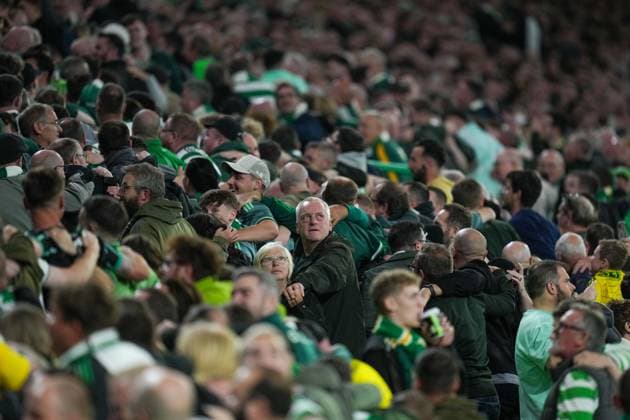 Celtic fans do a huddle in the stands. Celtic v Slovan Bratislava, UEFA Champions League, Group Stage, Football, Celtic Park, Glasgow, Scotland, UK, 18 Sep 2024 EDITORIAL USE ONLY No use with unauthorised audio, video, data, fixture lists, club league logos or live services. Online in-match use limited to 120 images, no video emulation. No use in betting, games or single club league player publications.  Copyright: xStuartxWallace Shutterstockx 14722221ap