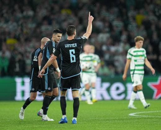 Kevin Wimmer of Slovan Bratislava celebrates with team mates after scoring to reduce Celtic s lead to 3-1. Celtic v Slovan Bratislava, UEFA Champions League, Group Stage, Football, Celtic Park, Glasgow, Scotland, UK, 18 Sep 2024 EDITORIAL USE ONLY No use with unauthorised audio, video, data, fixture lists, club league logos or live services. Online in-match use limited to 120 images, no video emulation. No use in betting, games or single club league player publications.  Copyright: xStuartxWallace Shutterstockx 14722221at
